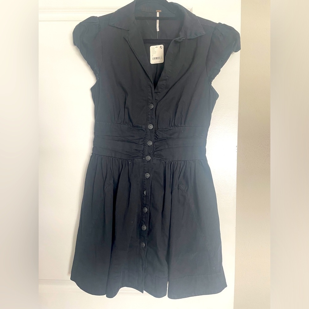 Free People black dress size small never worn.